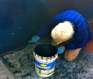 Millie energetically worked painting the lower walls.